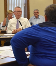 Lake City Mayor Mark Nichols addresses City Councilmember Cindy McGrath during a council workshop to prioritize areas and projects identified in a planning report commissioned by the city.